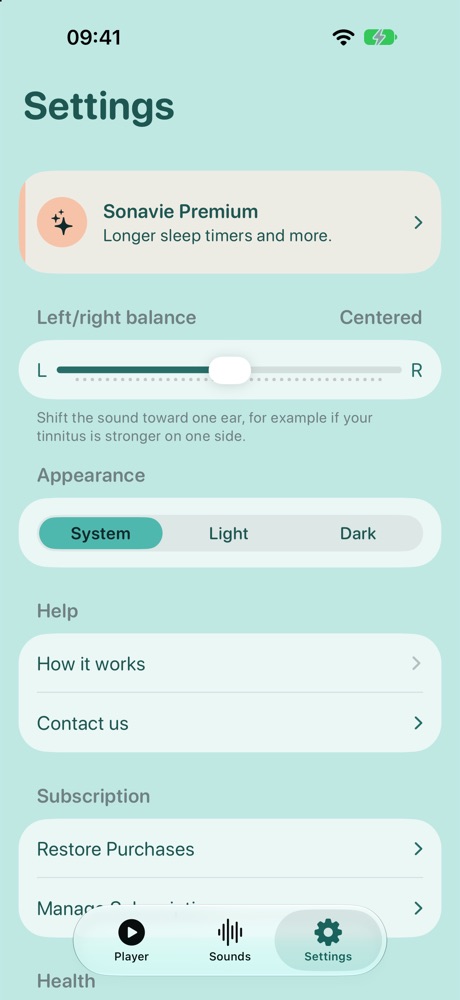 The Settings screen: a left and right balance slider, light and dark appearance, help and contact.
